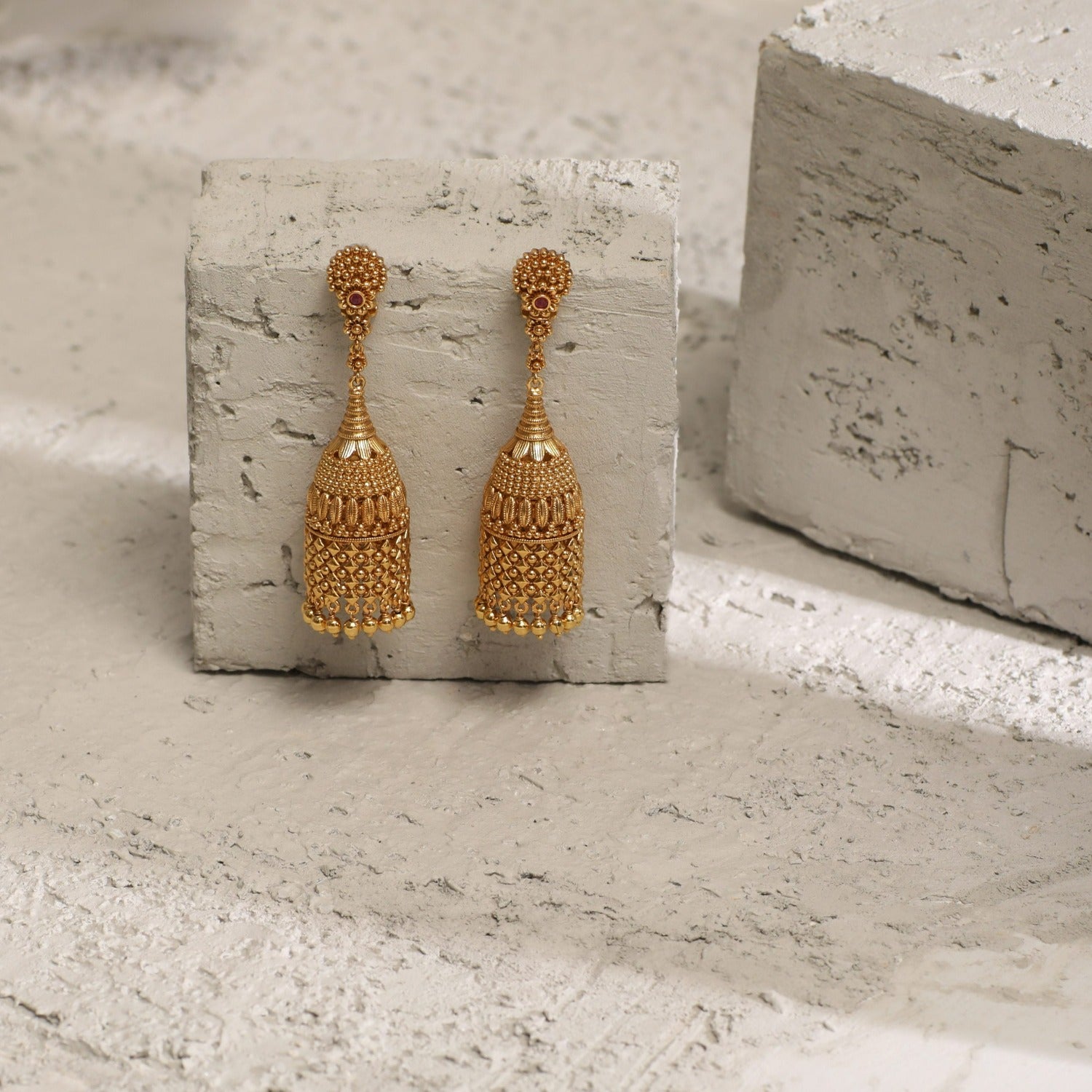 Swara Long Floral Silver Cylindrical Jhumka Earrings