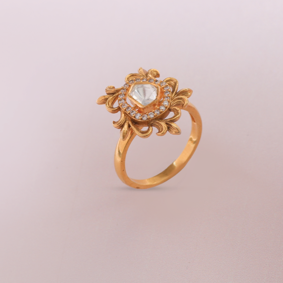 A picture of a statement finger ring, studded with a  Moissanite gemstone.