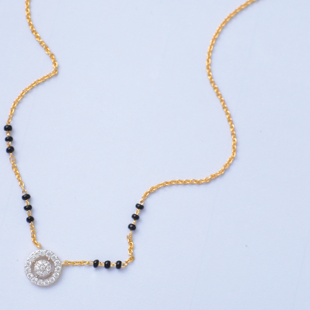 A picture of a Mangalsutra, crafted with Cubic Zirconia and Black Beads.