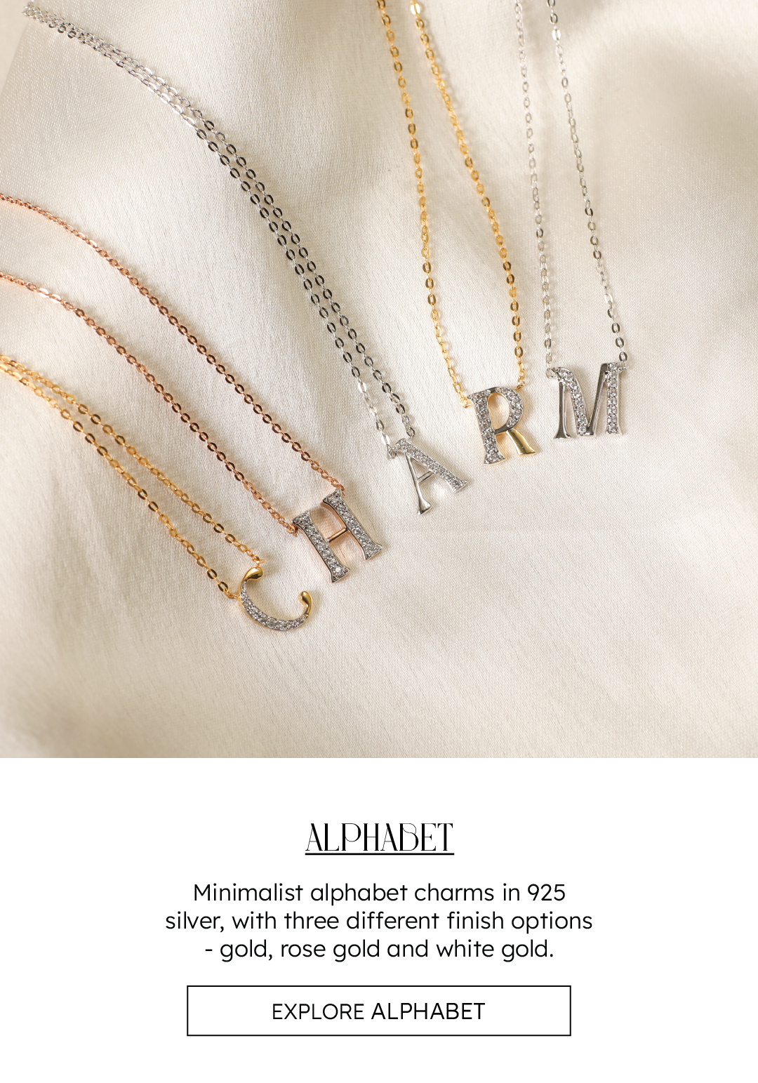 A picture of 5 silver short necklaces with the initials - C, H , A, R & M forming the word 'CHARM'.