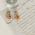 Rupa Navaratna Maroon Silver Drop Earrings