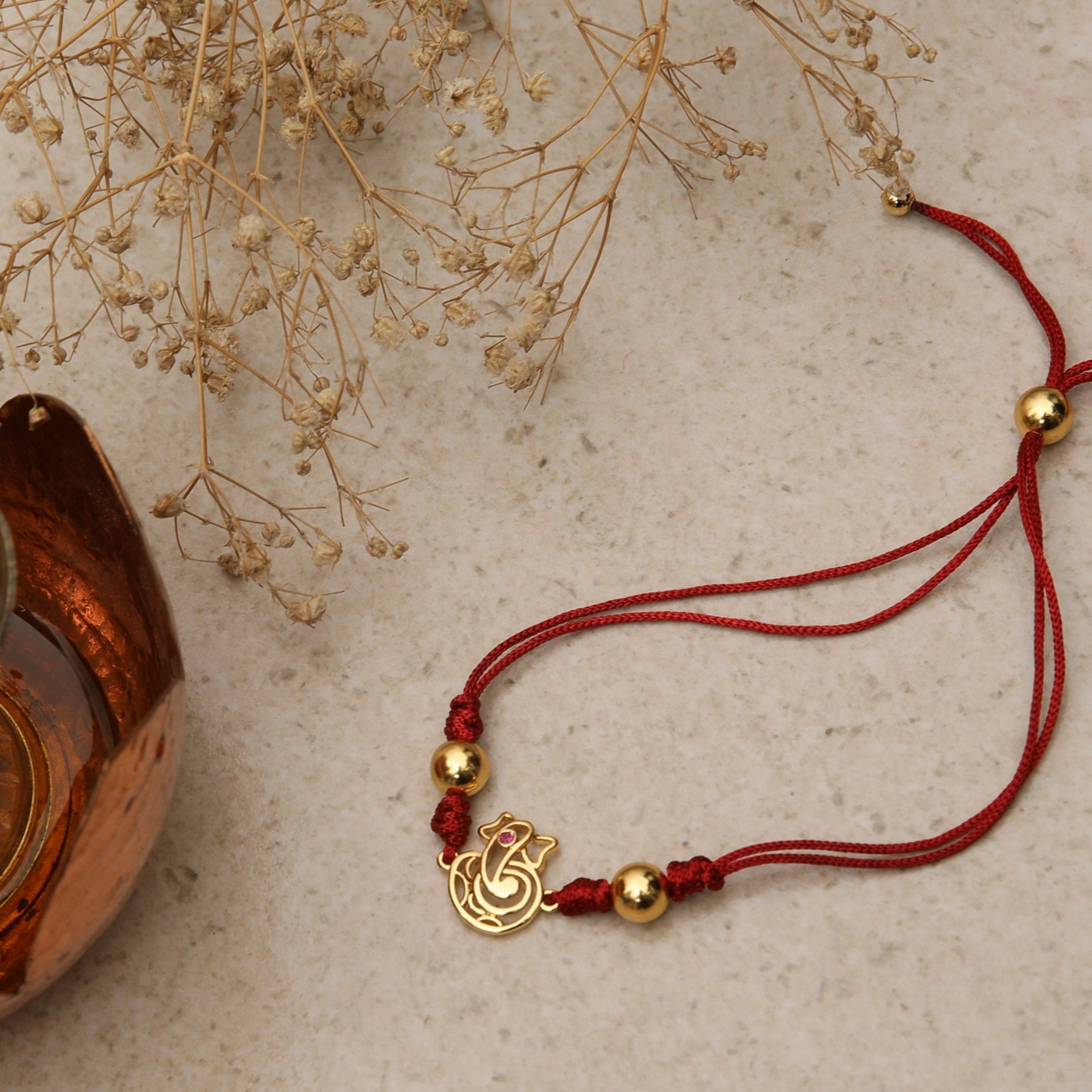 Shree Ganesha Gold Plated Silver Rakhi