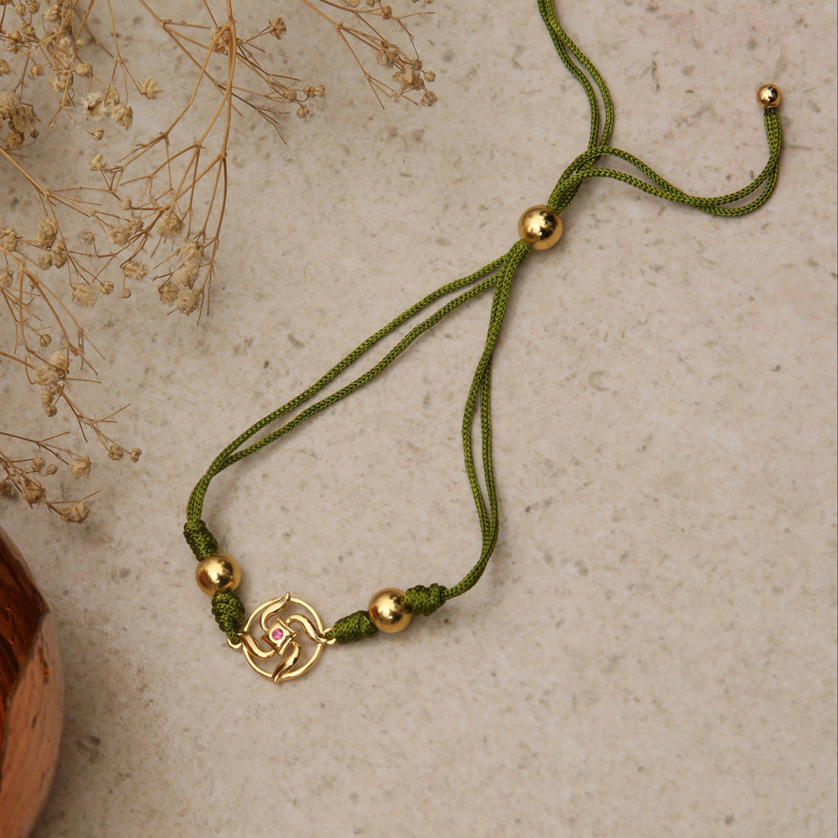 Swastik Shakti Gold Plated Silver Rakhi