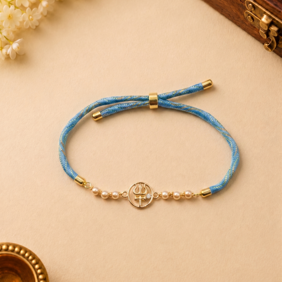Trishul Gold Plated Silver Rakhi