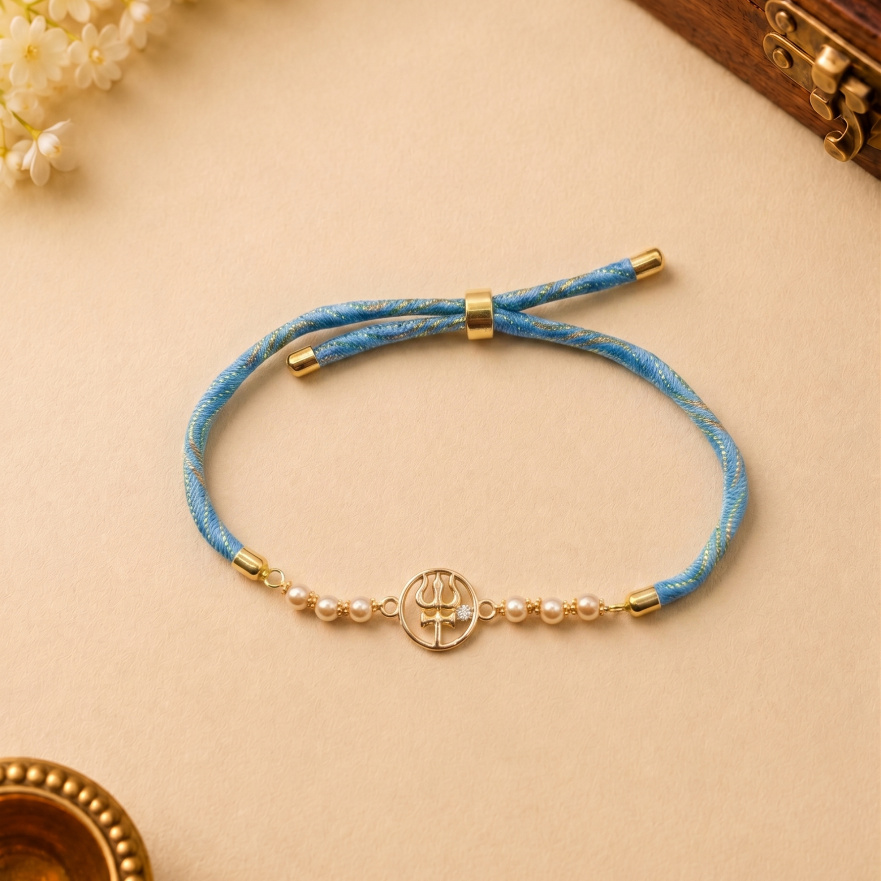 Trishul Gold Plated Silver Rakhi
