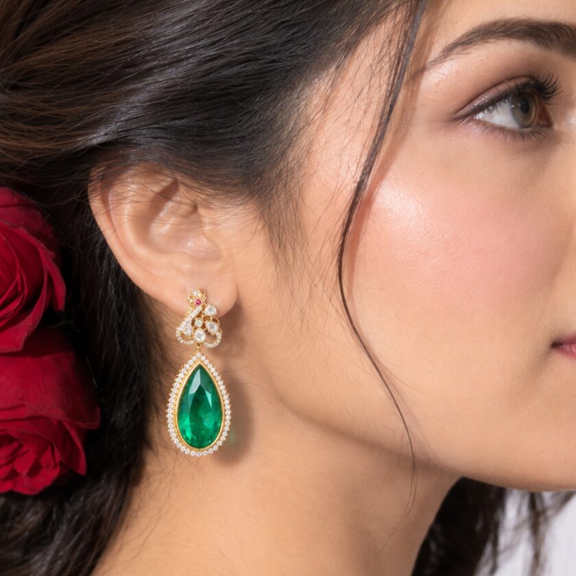 Gold-plated silver drop earring with a green stone