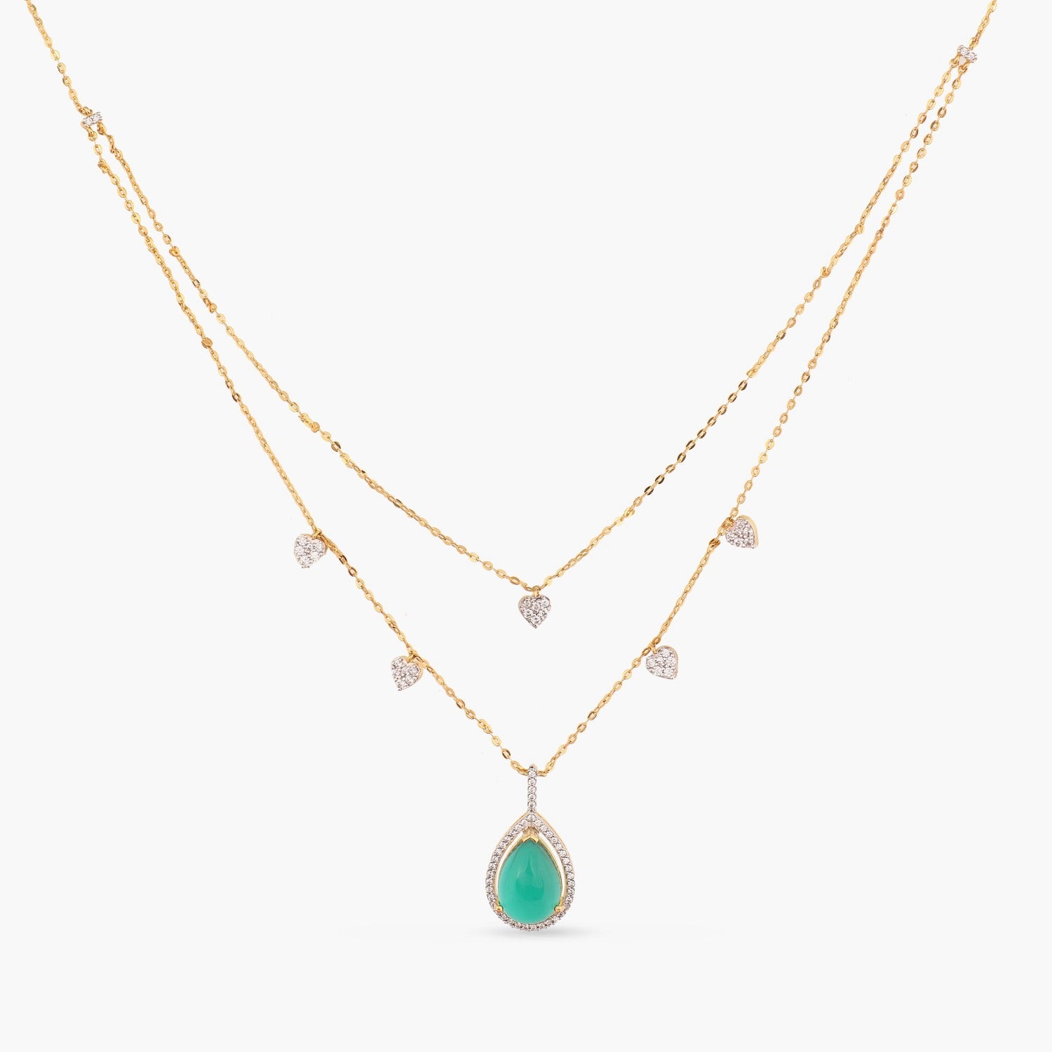 A picture of a double layered silver necklace with a teardrop-shaped pendant featuring green gemstone and Cubic Zirconia on a white background.