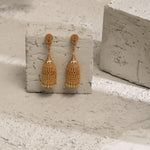 Swara Long Floral Silver Cylindrical Jhumka Earrings