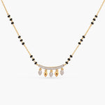 An image of a silver chain with black beads and cubic zirconia, featuring heart shaped pendants.