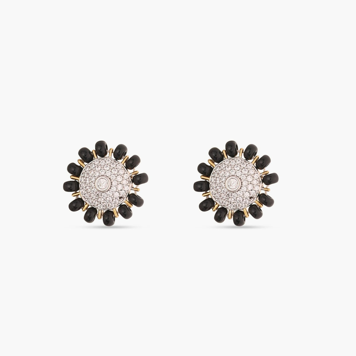 A picture of silver earrings with black beads and Cubic Zirconia in a floral design on a white background.