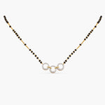 A picture of a silver necklace with black beads and Cubic Zirconia stone pendant on a white background.