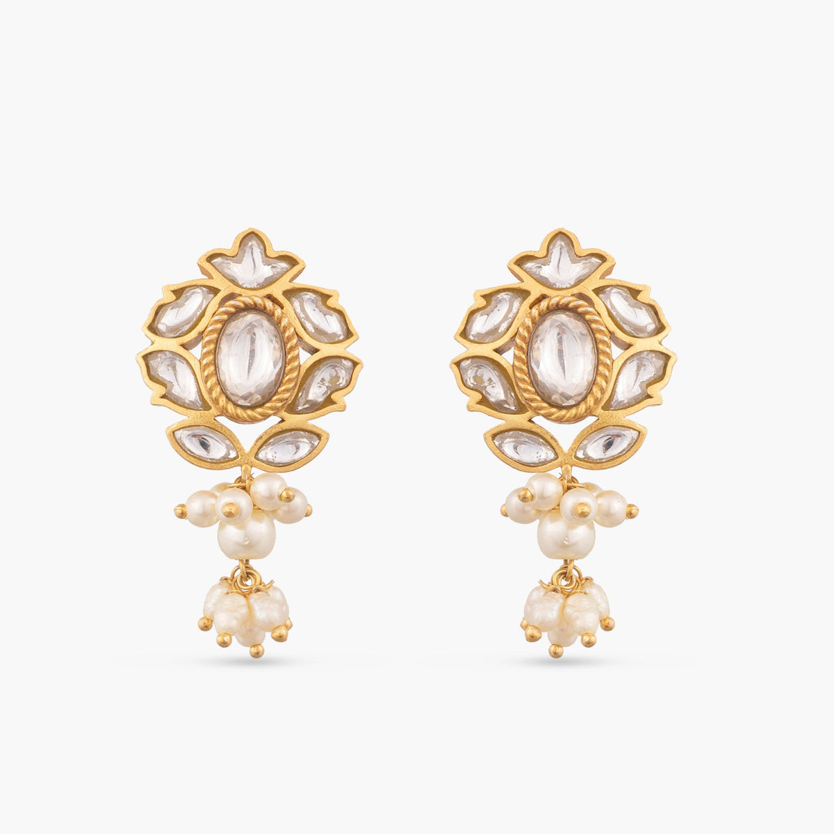 An image of a pair of silver earrings with Jadau stones on a white background.